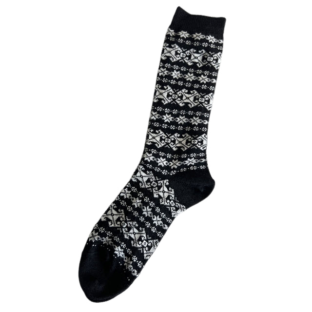 Black sock with white pattern on a white background