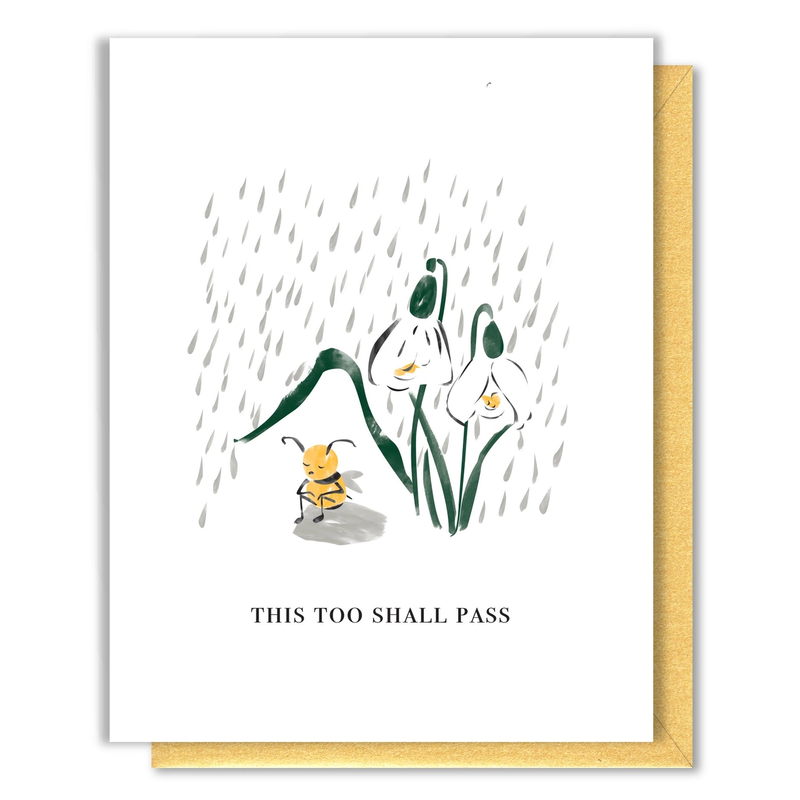 Greeting card with a bee and flowers illustration and 'This Too Shall Pass' text on a white background.
