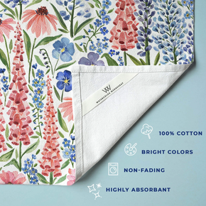 Floral-patterned towel with text highlighting features on a light blue background
