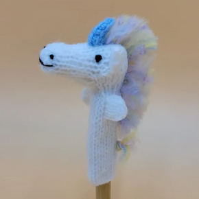 White unicorn finger puppet with pastel rainbow mane
