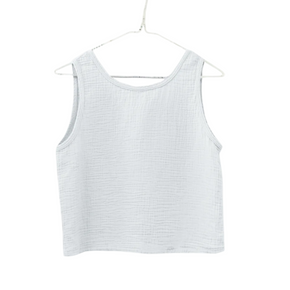 White tank top on a hanger with 'Salt' branding.