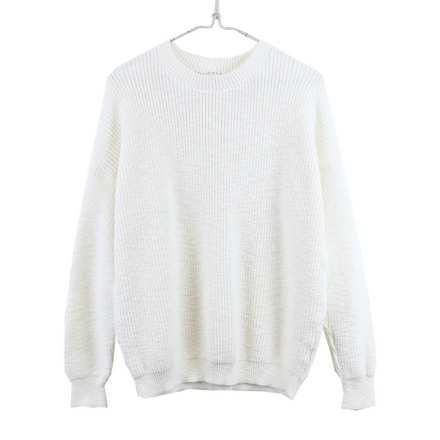 White sweater on a hanger against a white background