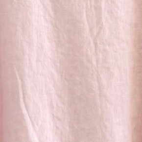 Close-up of light pink fabric texture