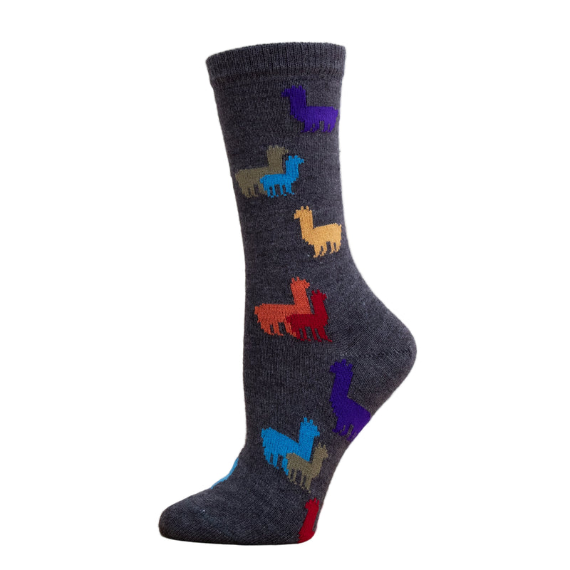 Children's Rainbow Alpaca Herd Socks. Charcoal socks with rainbow alpacas on them in front of a white background.