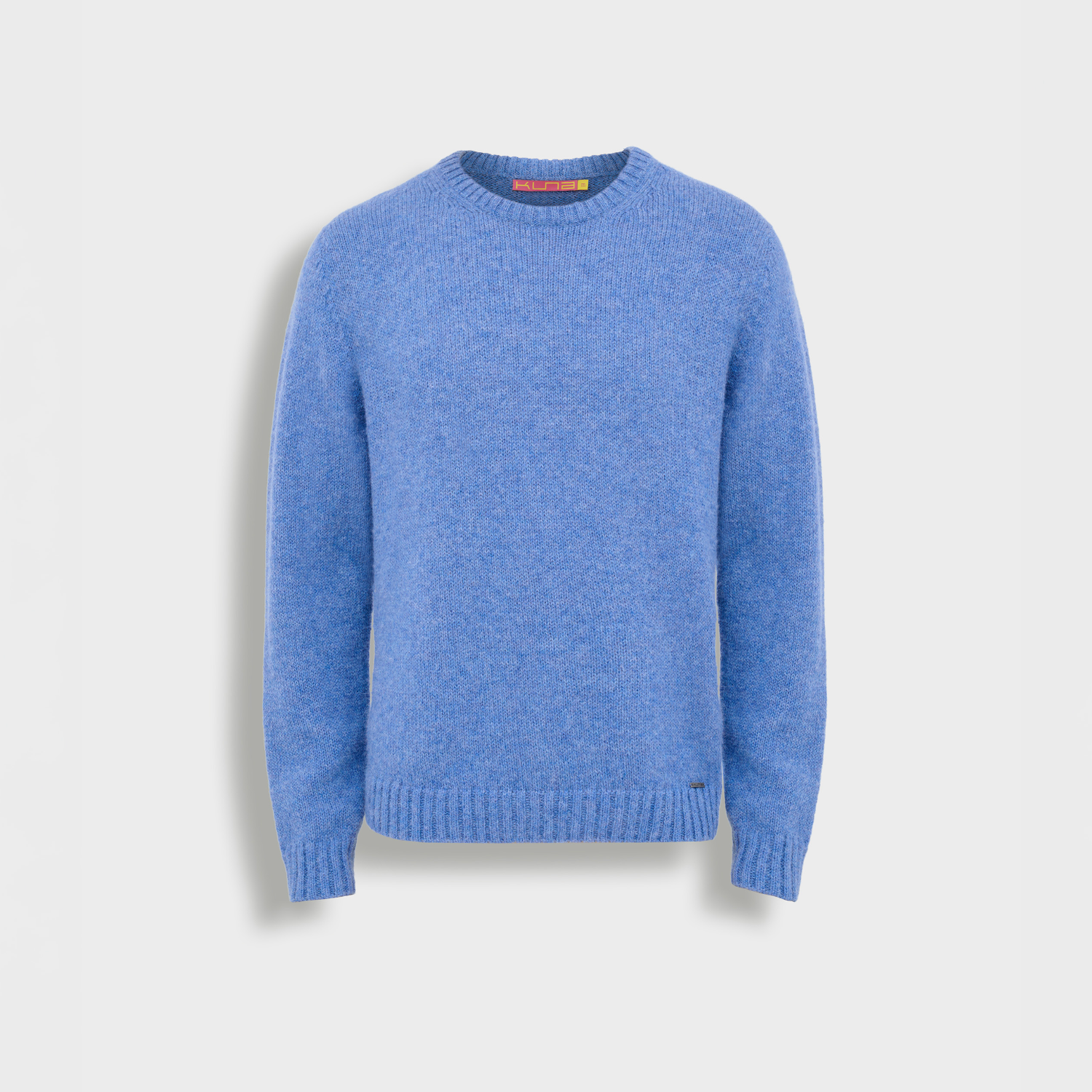 Blue sweater on a light gray background
