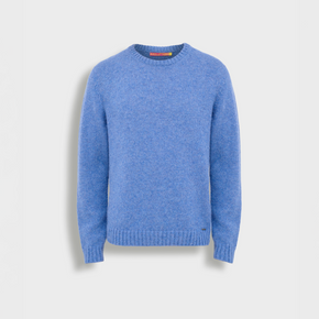 Blue sweater on a light gray background