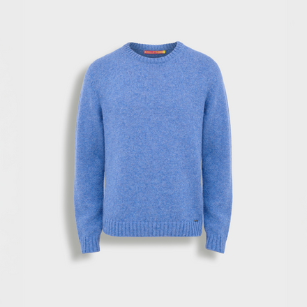 Blue sweater on a light gray background