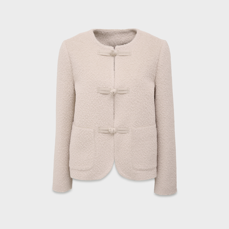 Beige jacket on a light gray background