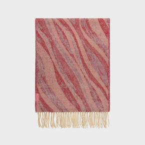 Striped scarf with fringes on a light gray background