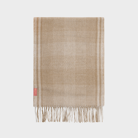 Beige woven scarf with fringes on a white background