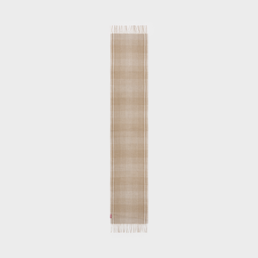Scarf with a woven pattern and fringe on a white background