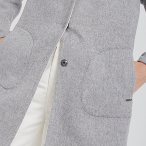 Gray jacket with a snap detail on a white background