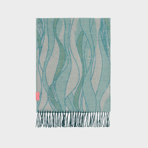 Teal and gray patterned scarf with fringes on a light gray background