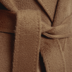 Close-up of a brown coat with a belt