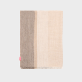 Two-tone beige and brown woven shawl on a light gray background