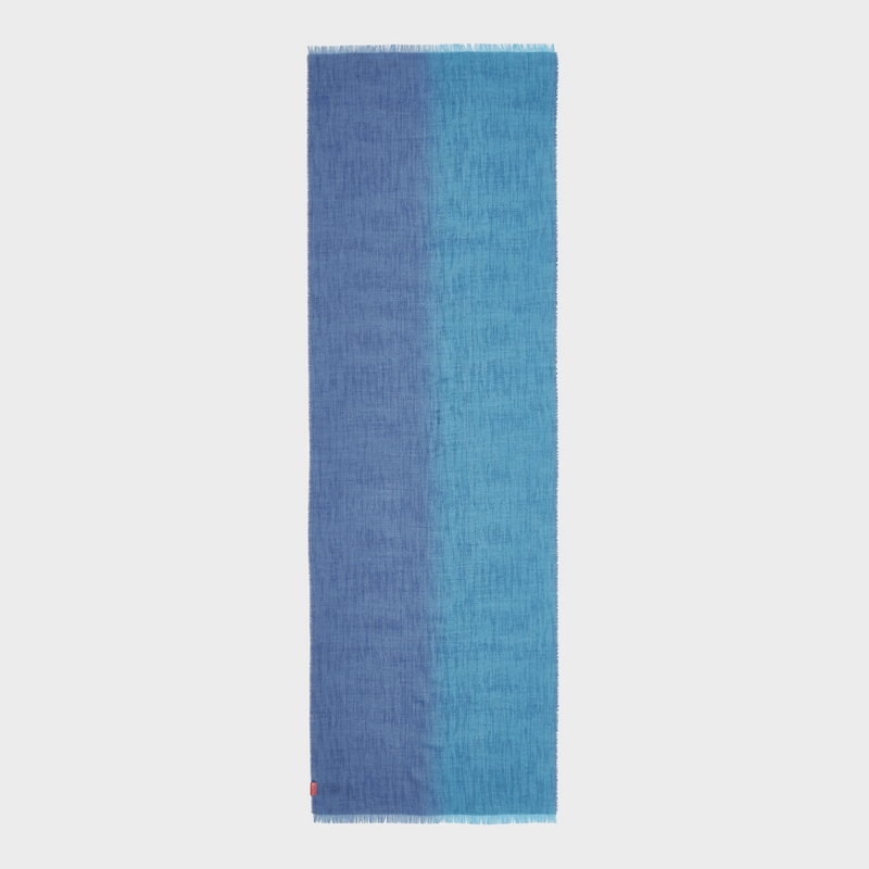 Gradient blue shawl on a light gray background