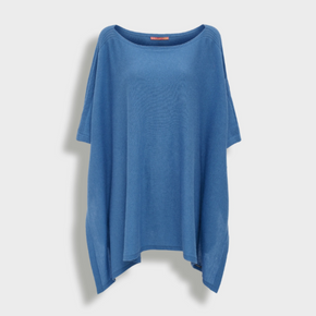 Blue poncho on a light gray background