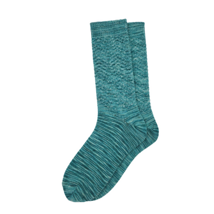 A pair of handpainted socks with a chevron pattern, featuring turquoise and multicolored bands.
