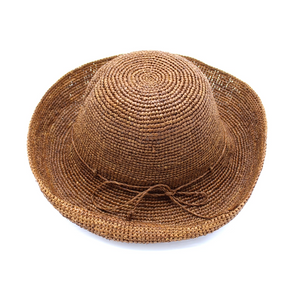 Brown straw hat on a white background