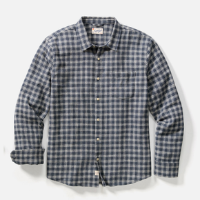 Plaid shirt with button details on a light gray background