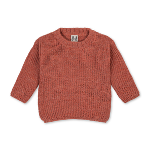 Knitted pink sweater on a white background