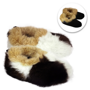 Pair of fluffy slippers in brown, white, and black on a white background.
