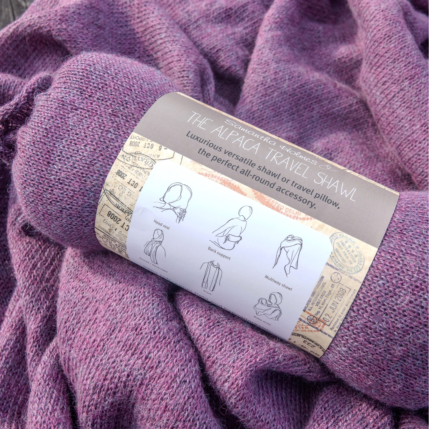 Purple travel shawl with a label on top