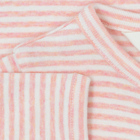 Close-up of pink and white striped onesie