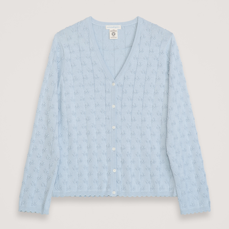 Light blue patterned shirt on a light gray background