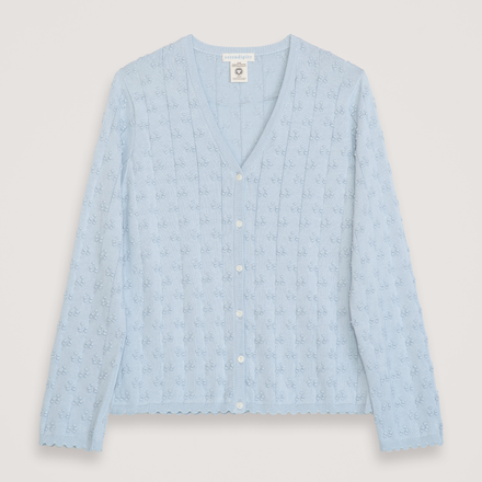 Light blue patterned shirt on a light gray background