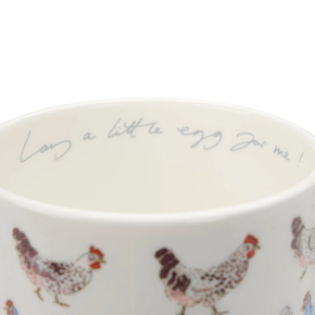 China mug with chicken illustrations and text on a white background