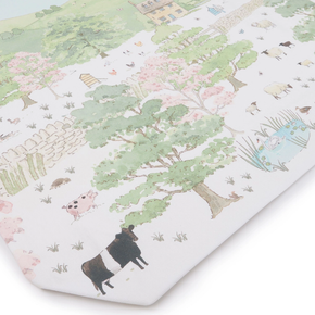 Patterned tote bag with animals and nature design on a white background