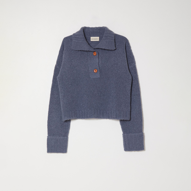 Atelier Delphine Stand Collar Jumper - slate blue sweater with folded collar, cuffed sleeves, and button closure on a neutral background