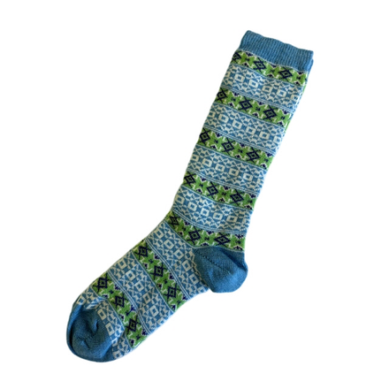 Blue and green patterned sock on a white background