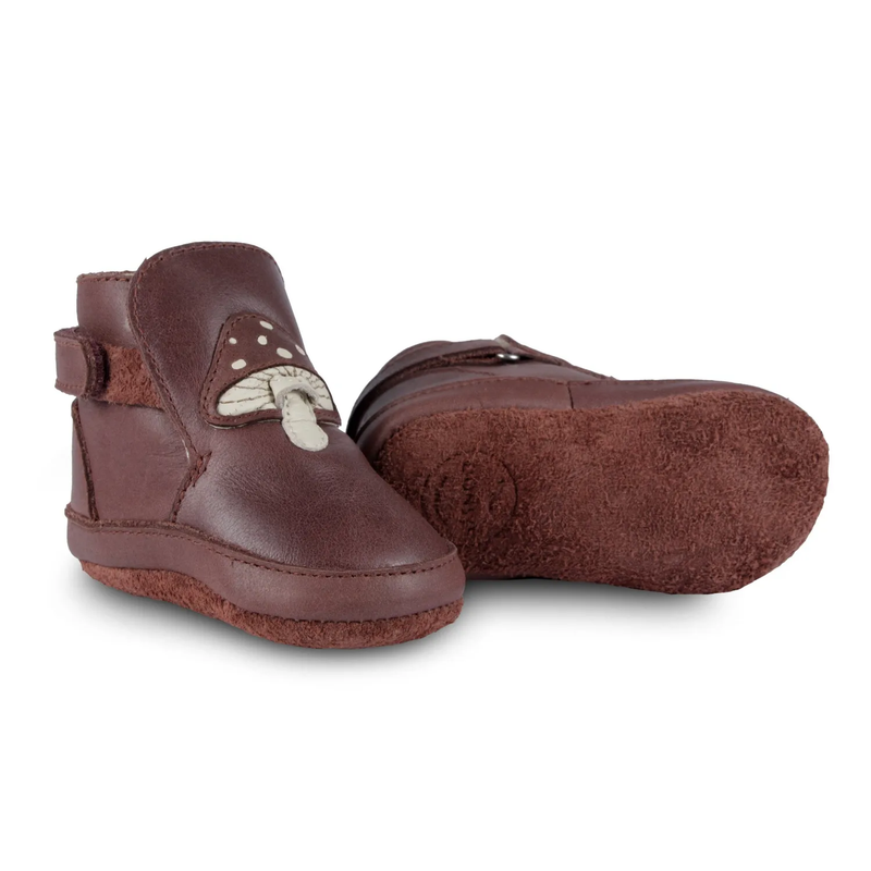 Donsje Toadstool Mush Lining Boots - dark red leather boots with mushroom detail, velcro strap, faux fur lining, and suede sole on neutral background
