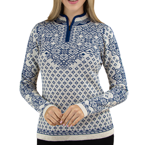 Woman wearing a blue and white patterned long-sleeve shirt on a white background