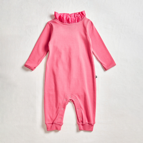 Oeuf Babies Voile Collar Jumper - pink onesie with ruffled collar on a neutral background