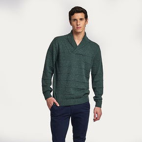 Kuna Washington Sweater - model wearing green sweater with ridged pattern and folded collar on a neutral background