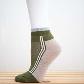 Alpaca Running  and Athletic Ankle Socks. A pair of dark olive green alpaca ankle running socks in front of a white background. 