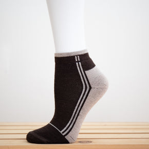 Alpaca Running  and Athletic Ankle Socks. A pair of brown alpaca ankle running socks in front of a white background. 
