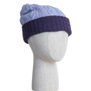 Two-toned knit beanie in light blue and purple on a mannequin head against a white background