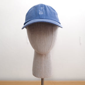 Fluff Alpaca Embroidered Baseball Hats, a periwinkle baseball hat with an embroidered alpaca on a mannequin head in front of a white background.