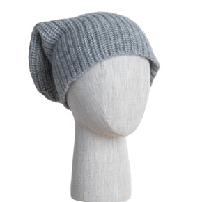 Gray knit beanie on a mannequin head against a white background