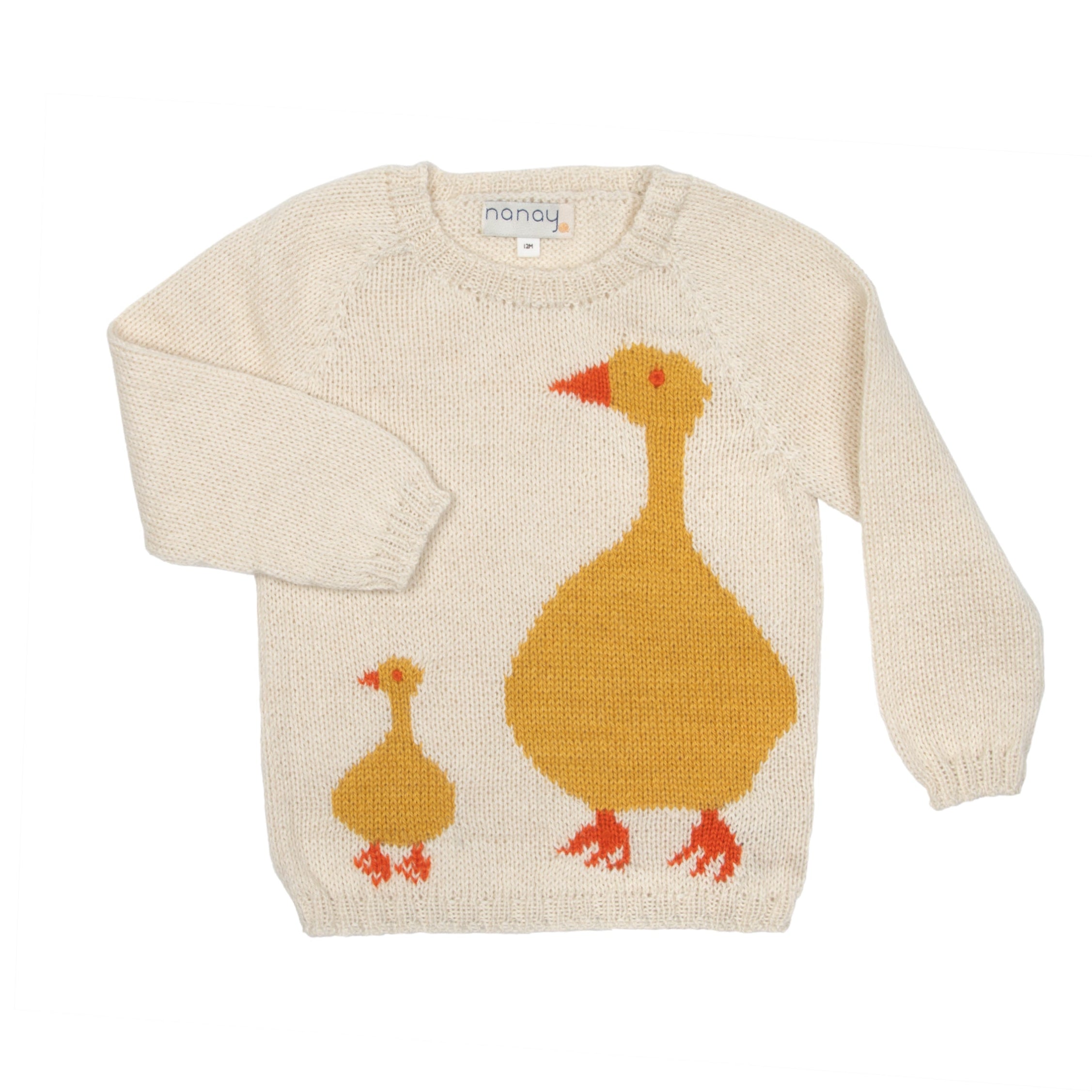Beige sweater with duck design on a white background