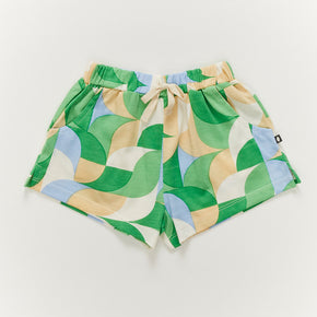 Oeuf Kid's Play Shorts - 100% GOTS Pima Cotton, a pair of green geometric print shorts on a white background.