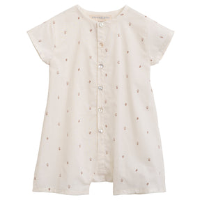 Serendipity Baby Button Suit - 100% GOTS Cotton, the front of a white onesie with flower patterns against a white background
