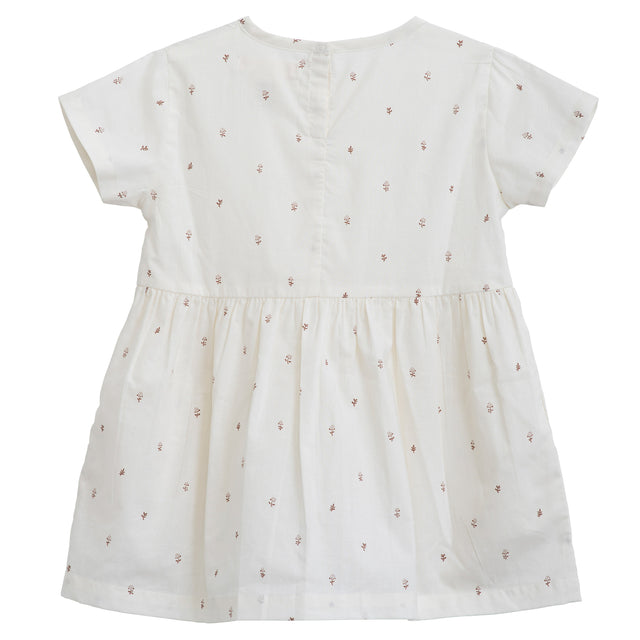 Serendipity Kid's Loose Dress - 100% Organic Cotton, the back of a White dress with reddish-brownish flowers on a white background
