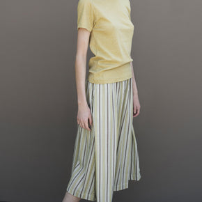 Serendipity Misty Stripes Cotton Skirt - 100% Organic Cotton, a woman wearing a yellow top and multicolor striped skirt