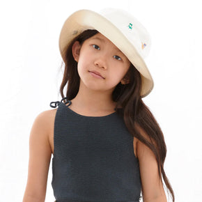 Oeuf Embroidered Bucket Hat - 100% cotton twill for summer, a girl with a blank tank top wearing a white embroidered bucket hat in front of a white background