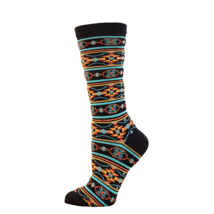A colorful pair of Santa Fe Alpaca socks displayed against a wooden backdrop, showcasing a geometric pattern with prominent turquoise and orange stripes.